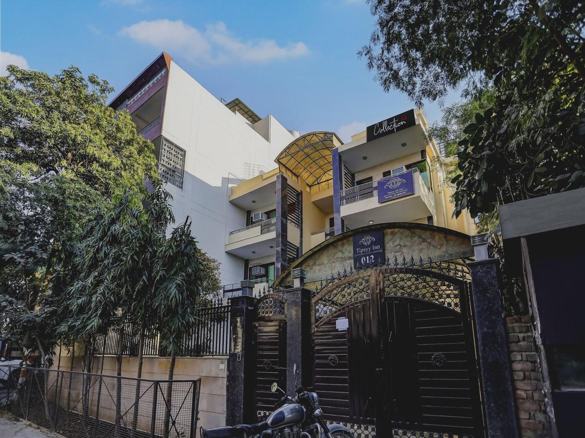 Hotel Super Capital O Uk House Residency Gurgaon Esterno foto