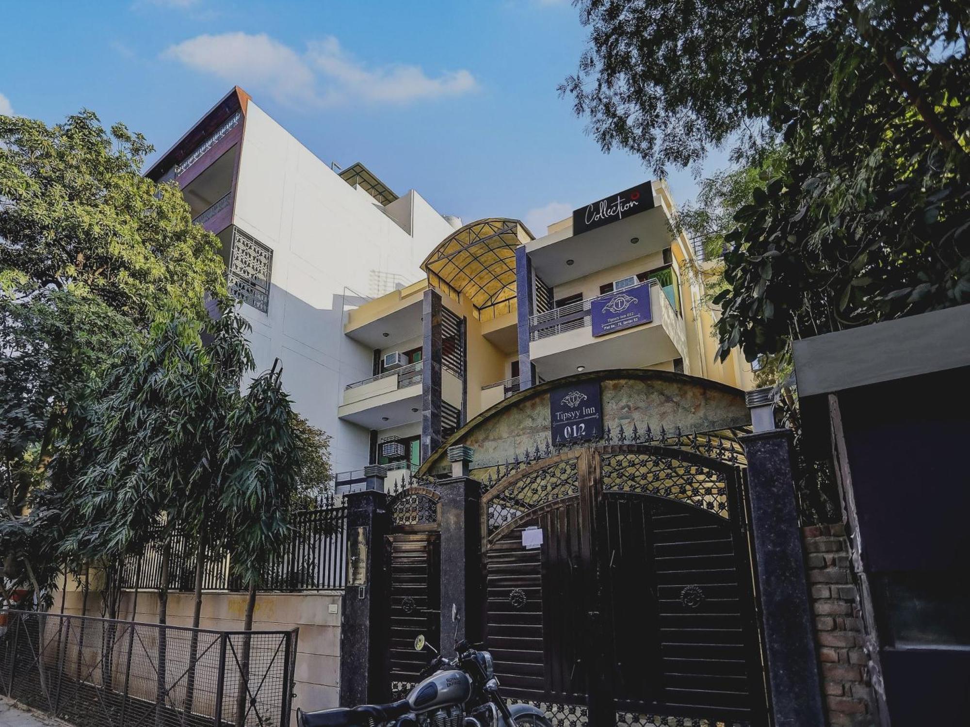 Hotel Super Capital O Uk House Residency Gurgaon Esterno foto