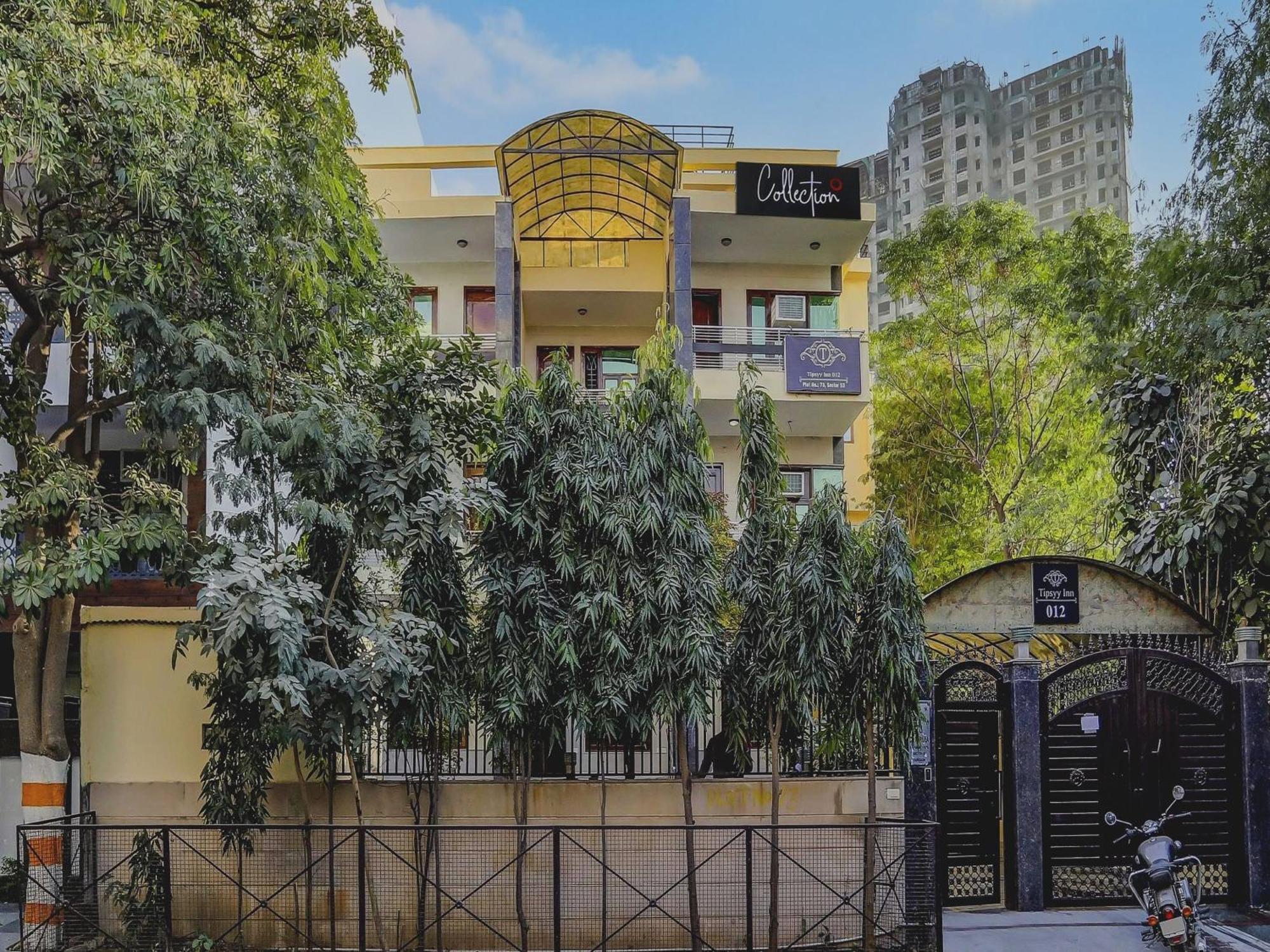 Hotel Super Capital O Uk House Residency Gurgaon Esterno foto